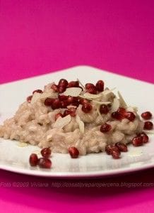Risotto con melagrana, caprino e mandorle in scaglie